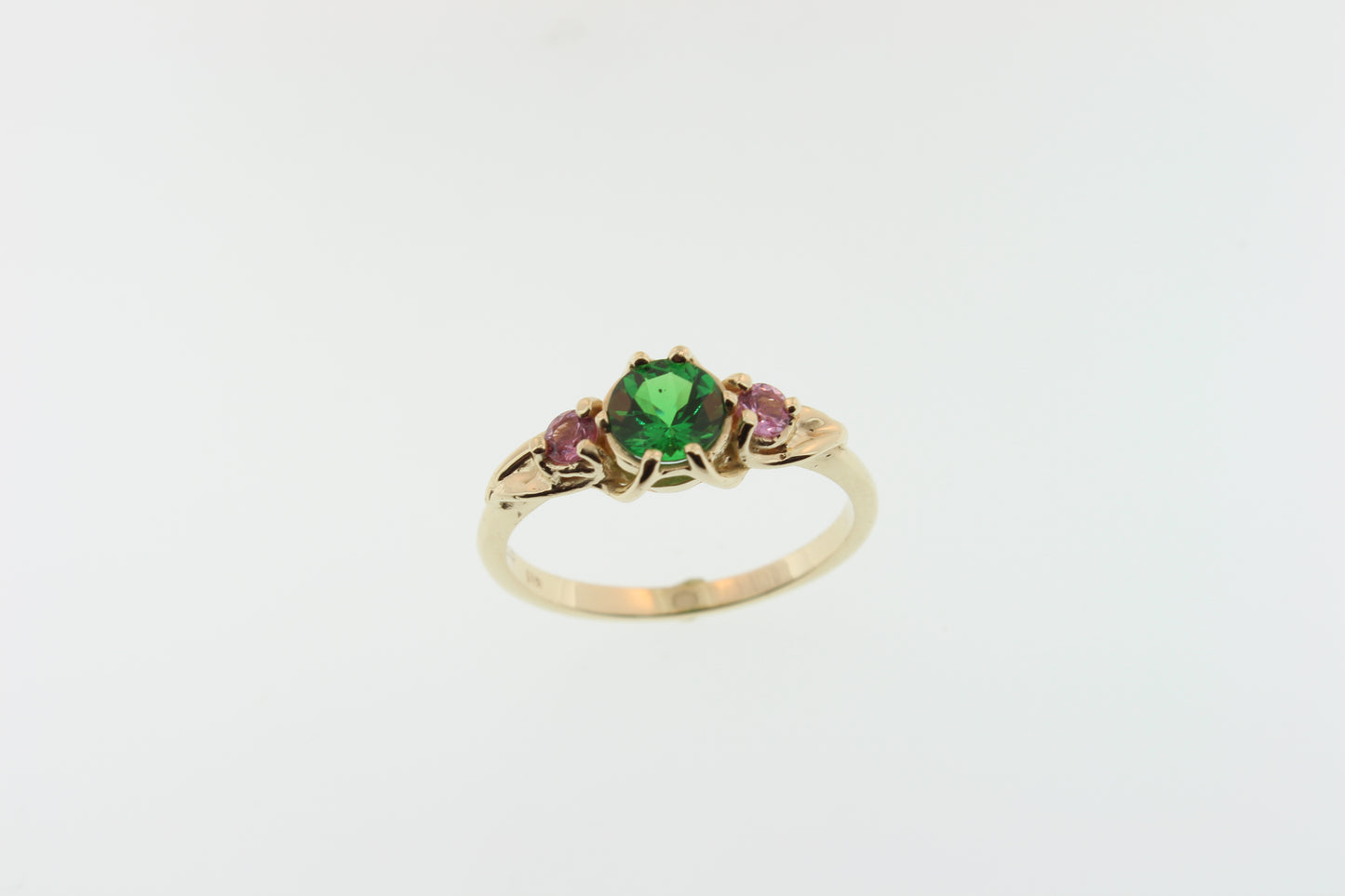 Brilliant Green Garnet and pink Sapphire ring. Set in 14k recycled yellow gold.